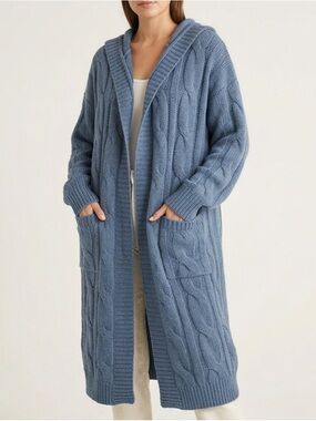 Stylish blue cable knit cardigan. Perfect for layering. Has pockets and hood.